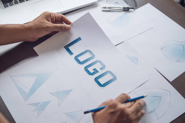 istock Graphic designer creative design sketch drawing logo Trademark brand Workspace 1211158787