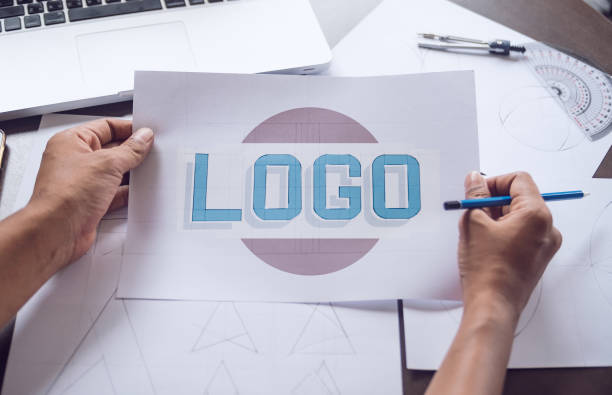istock Graphic designer creative design sketch drawing logo Trademark brand Workspace 1211158790