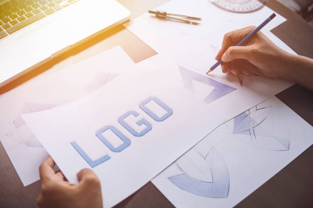 istock Graphic designer creative design sketch drawing logo Trademark brand Workspace 1211158797