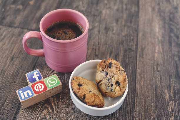 cookie and hot coffee on white napkin