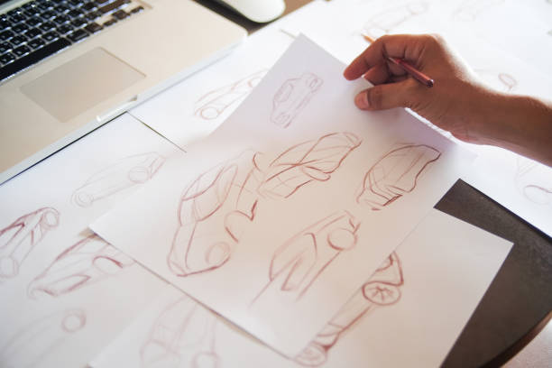 istock Graphic designer artist Work drawing sketch design development Prototype car Automotive industrial creative visual concept 1211159200