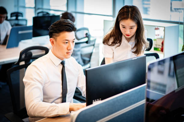 istock Business coworkers working together at office 1211159467