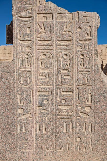 istock Hieroglyphic carvings on an ancient egyptian temple wall 1211161643