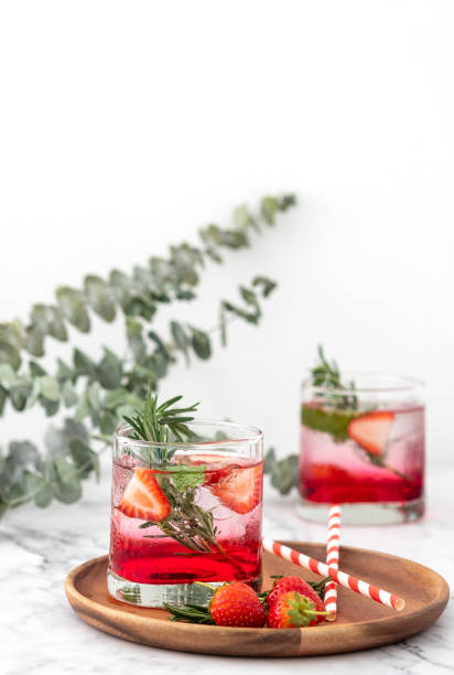 istock Summer strawberry drink on marble white background. 1211163047