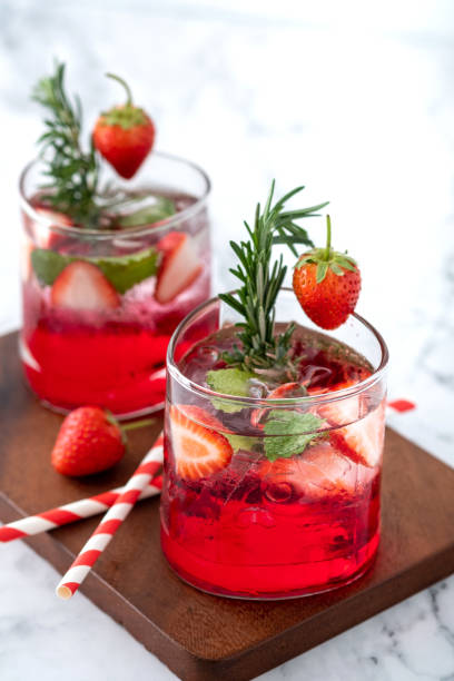 istock Summer strawberry drink on marble white background. 1211163067