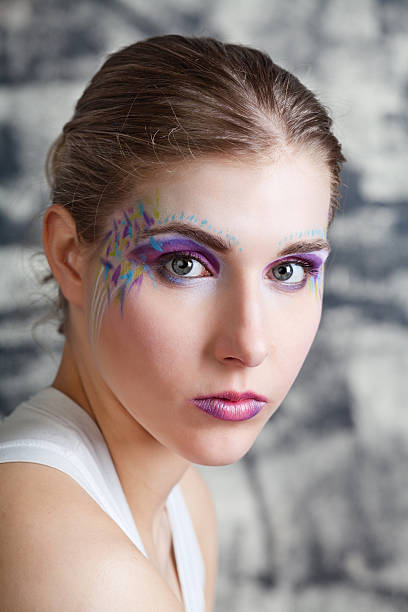 istock Young woman with face art 121116489