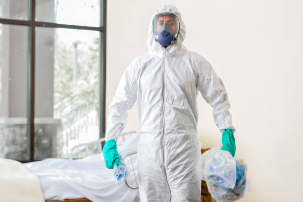 Hospital Worker Disposing of Contagious Materials stock photo