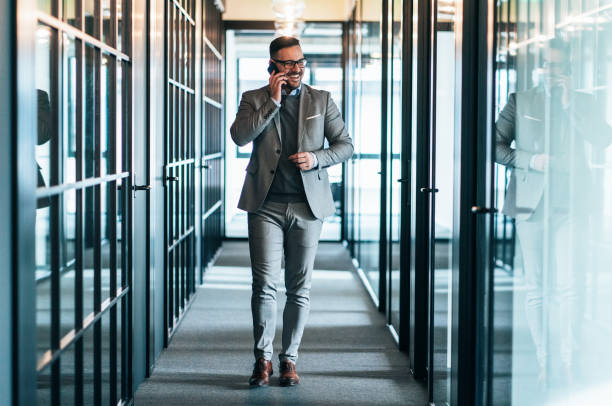 istock Businessman talking on the phone 1211171803