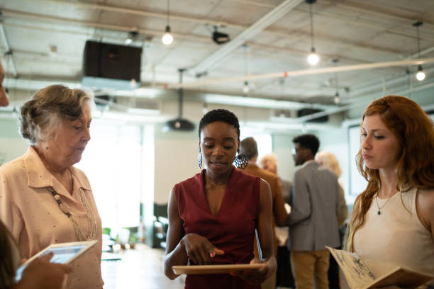 istock Business people talking at seminar 1211173994
