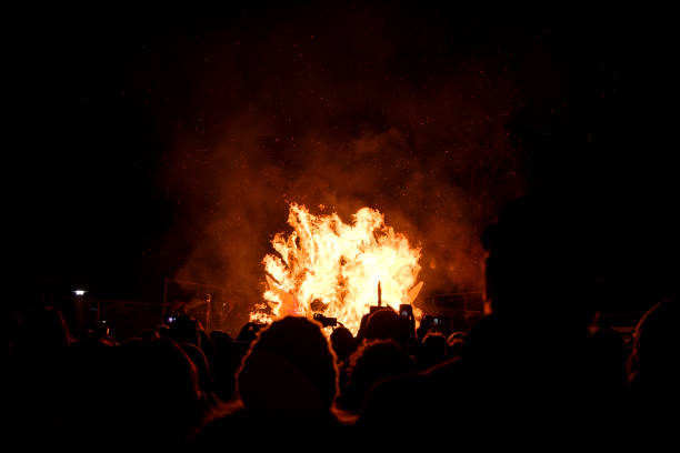 istock Crowd watching traditional fire festival at night 1211174577