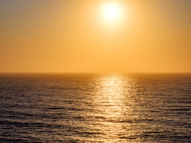 istock Calm sea at sunset 1211175948
