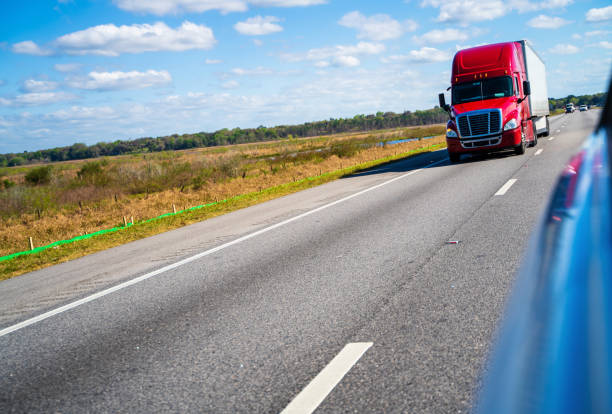 istock Truck on the Highway 1211184085