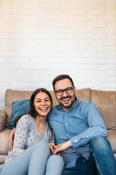 istock Casual romantic couple at home, portrait. 1211185889
