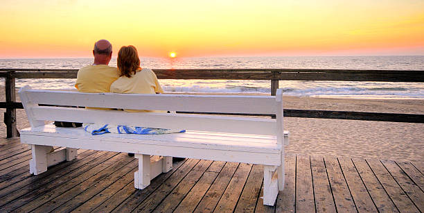 Couple at Dawn - Bethany Beach, Delaware stock photo
