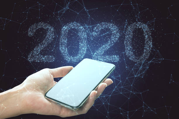 istock Businessman hand holding phone 1211192394