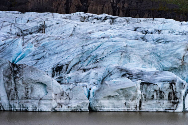 istock Glacier details with ash in the ice - Iceland 1211193894