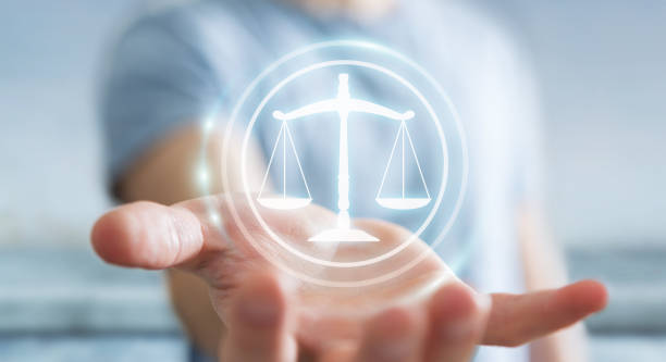 istock Businessman on blurred background using law protection right 3D rendering 1211195828