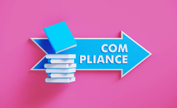 istock Book Stack Sitting over A Blue Arrow Shaped Directional Sign on Pink Background 1211197443