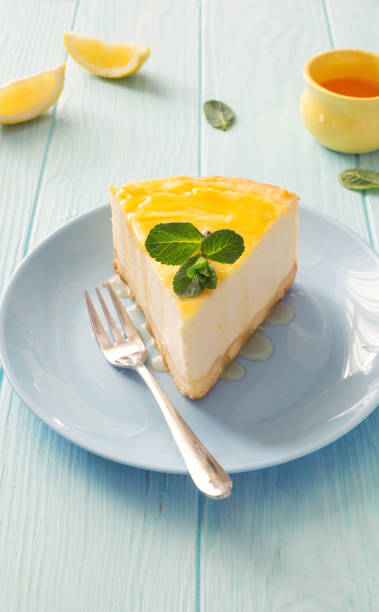 istock New York cheesecake on a blue plate close up 1211197507