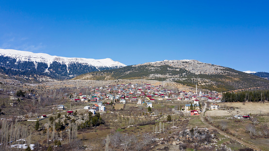 Aerial view of a small village on top of Toros Mountains. Arslankoy village in Mersin, Turkey.