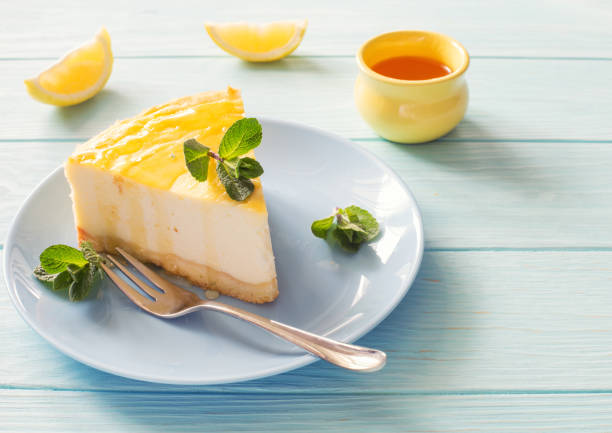 istock New York cheesecake on a blue plate close up 1211199105