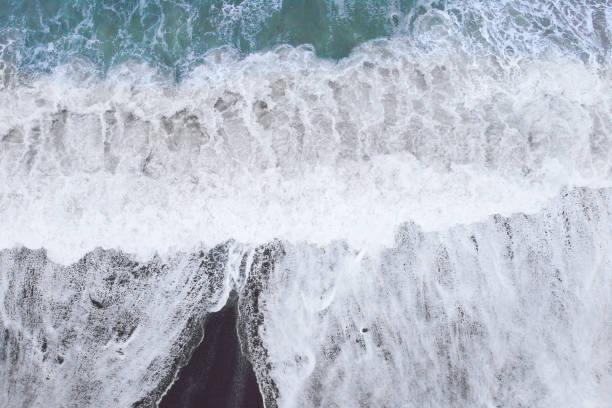 istock Beach and waves from top view from drone. Turquoise water background from top view. Travel concept and idea. 1211200177