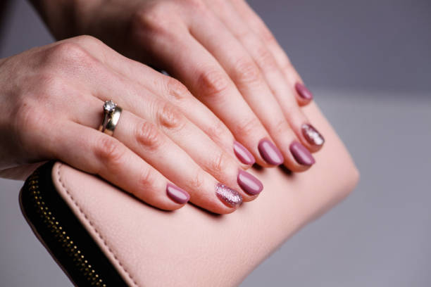 istock Nails Design. Hands With Bright Pink Spring Manicure On Grey Background. Close Up Of Female Hands. Art Nail. 1211201774