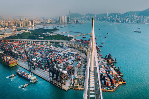 istock Bridge and freight ship Transportation in Hongkong, China 1211204303