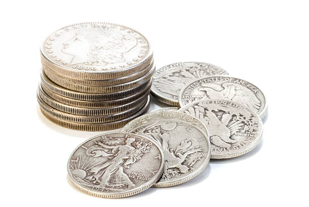 Dólar de prata e moedas de Cinquenta Cêntimos - fotografia de stock