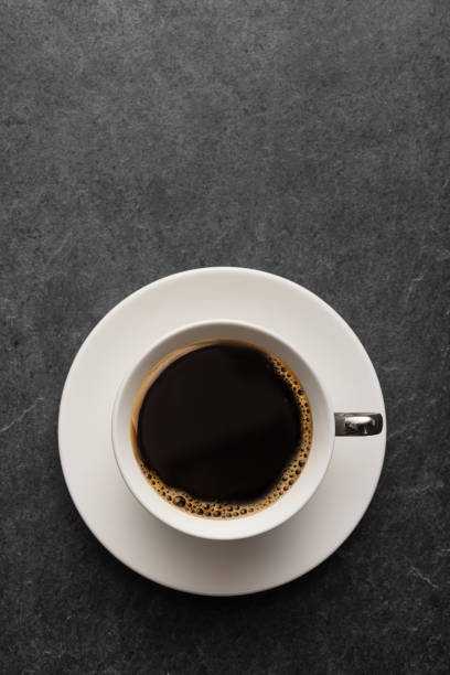 Cup of coffee on table Cup of coffee on gray table from above black coffee photos stock pictures, royalty-free photos & images