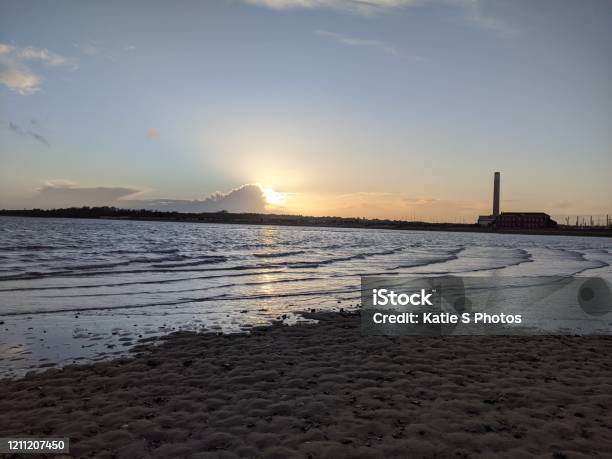 Sunset At Calshot Beach Stock Photo - Download Image Now - Beach, Coastline, Horizon Over Water