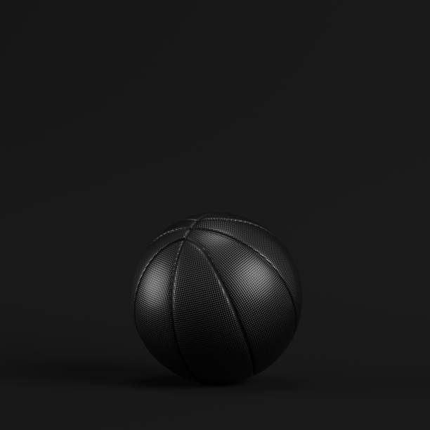 istock Black basketball ball on dark background. Minimalism concept. 1211216196