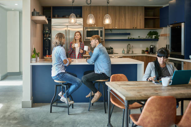 Freelancers Enjoying Coffee Break in Coworking Office