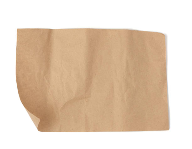 istock piece of brown parchment paper with torn edges isolated on a white background 1211217507