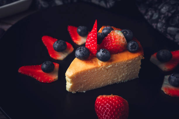 istock Cheesecake with blueberries and strawberries. Sweet dessert. 1211219778