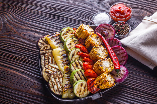 istock appetizing fresh grilled vegetables in a cast iron skillet 1211219934