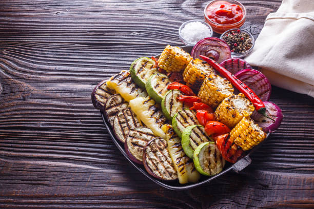 istock appetizing fresh grilled vegetables in a cast iron skillet 1211219938