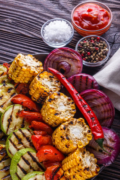 istock appetizing fresh grilled vegetables in a cast iron skillet 1211219954