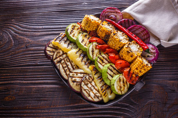 istock appetizing fresh grilled vegetables in a cast iron skillet 1211219980