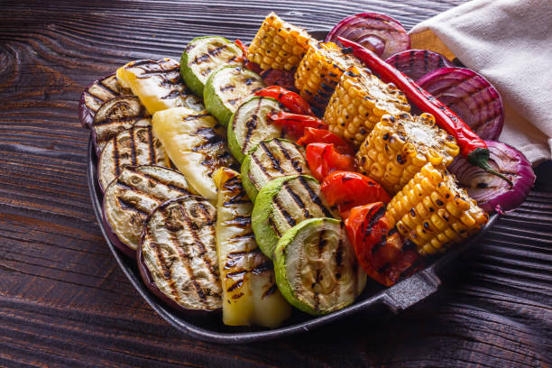 istock appetizing fresh grilled vegetables in a cast iron skillet 1211219993