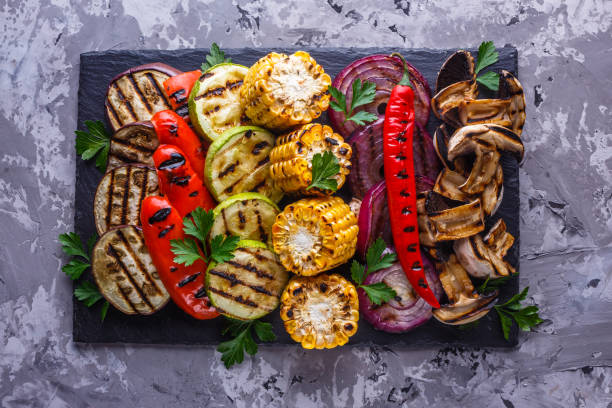 istock delicious fresh grilled vegetables on a stone plate 1211220037