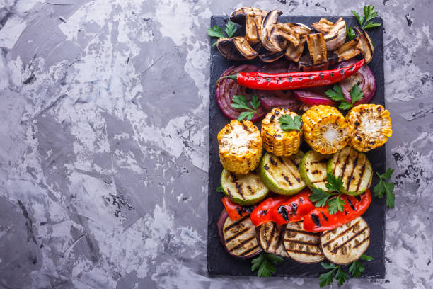 istock delicious fresh grilled vegetables on a stone plate 1211220041