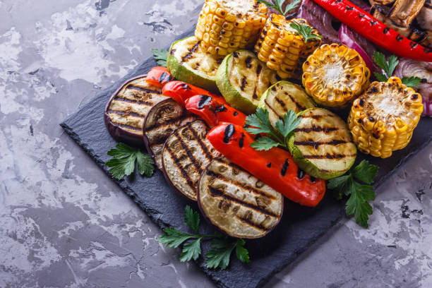 istock delicious fresh grilled vegetables on a stone plate 1211220042