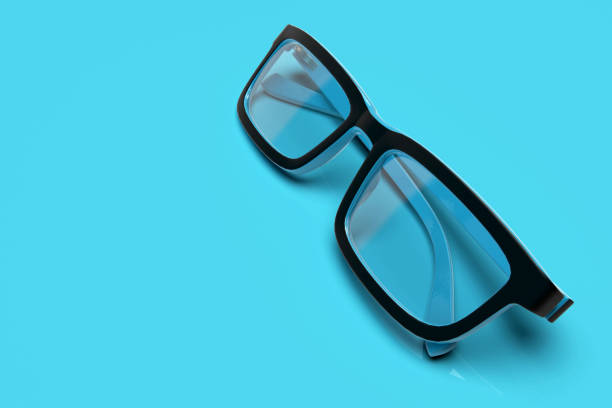 istock Glasses isolated blue background stock photo 1211221193