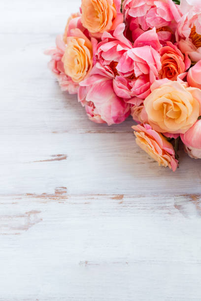 istock Fresh bunch of pink peonies and roses 1211221236