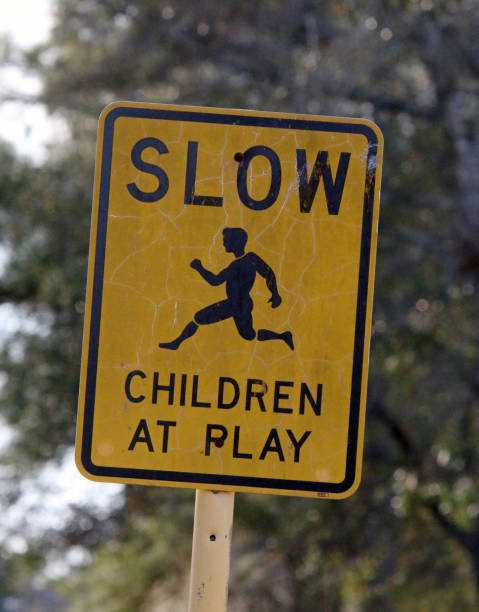 istock Slow, Children at Play Sign 1211223473