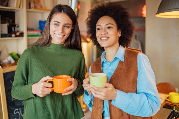 istock Two attractive young women socializing 1211226455
