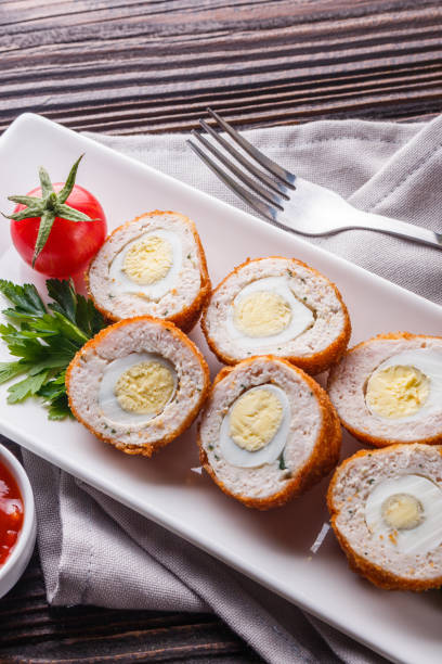 istock Scotch egg meat balls on rustic wooden background 1211227874