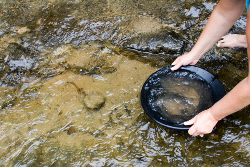 gold panning iin a small stream in northern michigan