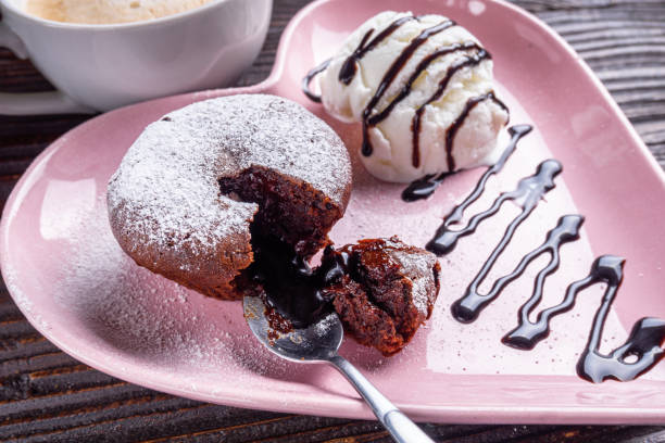 istock chocolate fondant with ice cream on wooden rustic background 1211229015
